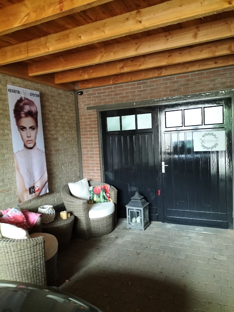 De entree van 't Knipperijke onder de veranda